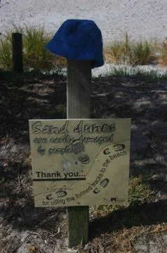 Sand Dune Sign, Post &amp; Hat Stock Photos