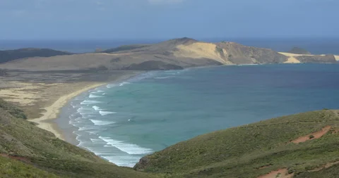 Sand dunes and beach at the tip of Cape Reinga, North Island, New Zealand Stock Footage 141652457