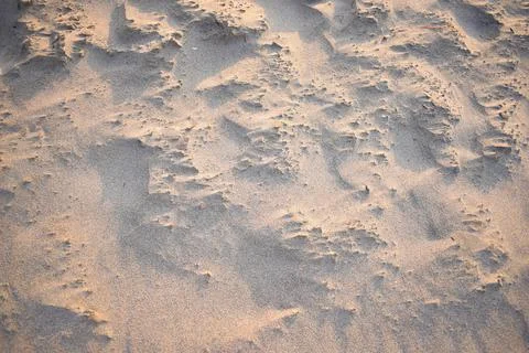 Sand dunes created by the wind. Lay flat Stock Photos