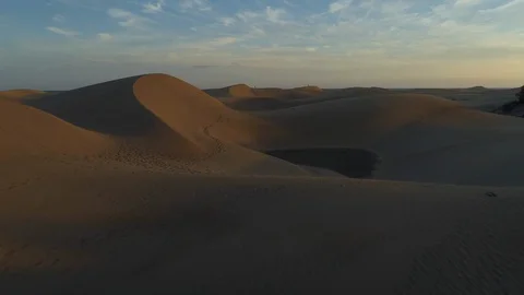 Sand Dunes - Desert Sunset Flying Low Along Dunes Stock Footage 100708685