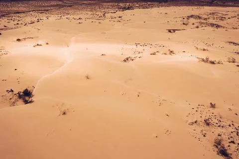 Sand dunes in Las Dunas de Corralejo, Corralejo Natural Park, dramatic clou.. Stock Photos
