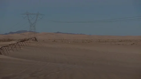 Sand dunes with sand buggy Stock Footage 72629211