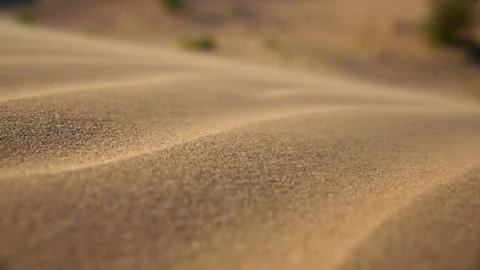 Sand dunes shift gently under sunlight, showcasing fine textures and patterns Stock Footage 340273143