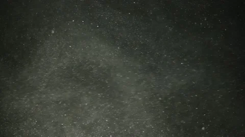 Sand dust in slow motion on a black background 動画素材 233636741