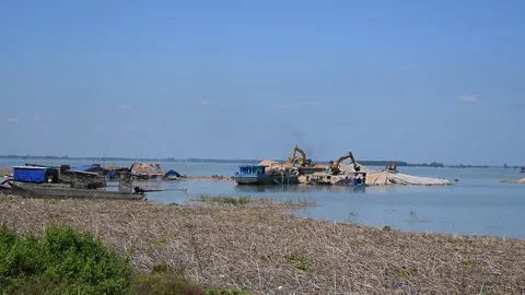 Sand exploit on river with floating house Stock Footage 90107650