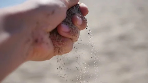Sand Falling From Hand. Entertainment and outdoor games 動画素材 76845733