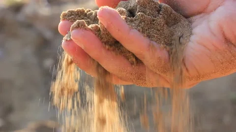 Sand falling from hand Stock Footage 49129019