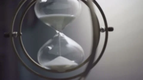 Sand falling from an hourglass Close Up. Stock Footage 162649586