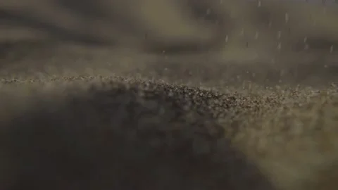 Sand falling in macro Stock Footage 239921604