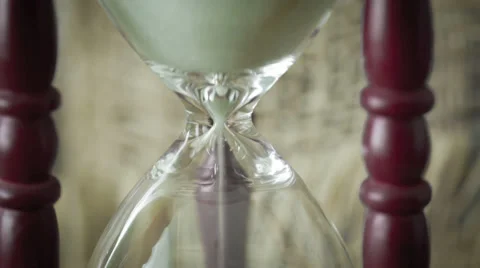 Sand falling through an Hourglass Stock Footage 37035763
