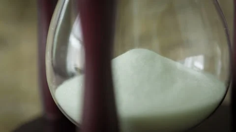 Sand Falls Quickly Through An Hourglass Stock Footage 37035759