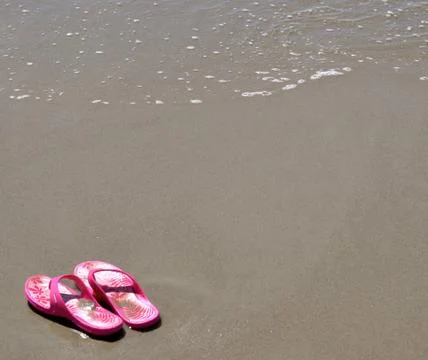 In the sand - flip-flops 20 Stock Photos