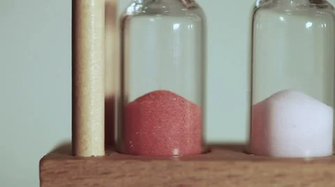 Sand flowing through two hourglasses - timelapse (30 seconds) 스톡 동영상 52210478