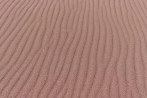 Sand formations with ripples regular pattern. Stock Photos