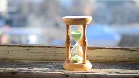 Sand glass on a windowsill Stock Footage 71270950