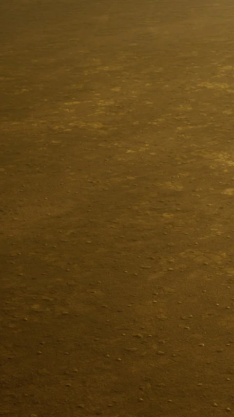 Sand on the ground shows texture under warm light in an outdoor space Stock Footage 335949301
