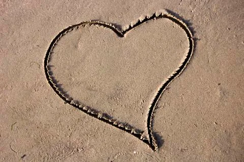 Sand heart Stock Photos