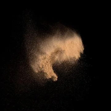 Sand, isolated on black background. Stock Photos