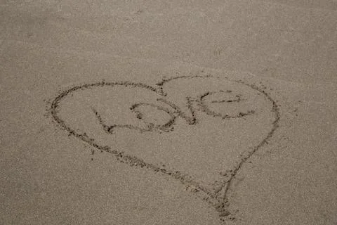 Sand message love Stock Photos