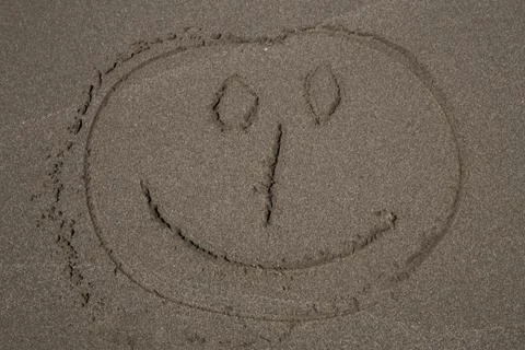 Sand message smiley Stock Photos