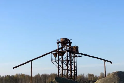 Sand mining night shift with sunset sky . Stock Photos