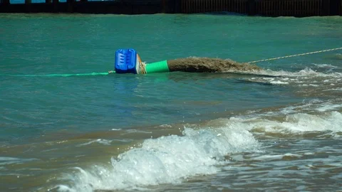 Sand mining. Pump for transferring sand from the bottom of the sea to the bea Video stock 120106950