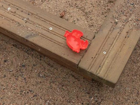 A sand mold in the shape of a crab Stock Photos