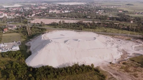 Sand mountain in green fields, natural landscape drone shot. Stock Footage 145884604