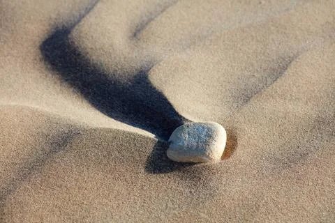 Sand pattern and one shingle, interesting abstract texture Foto stock