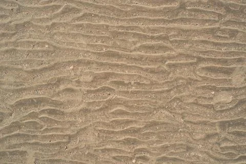 Sand pattern texture. Sand waves on the beach. Wave, sand dunes, dry desert.. Foto stock