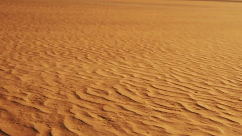 Sand patterns in desert landscape show the shift of wind and time Stock Footage 338322605