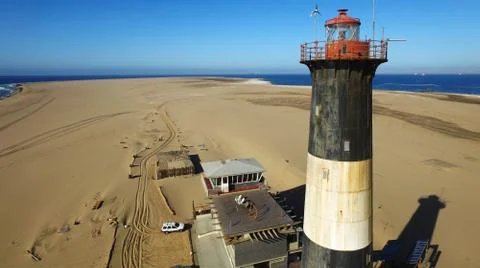 Sand peninsula with old lighthouse in Namibia, southern Africa Fotos de archivo