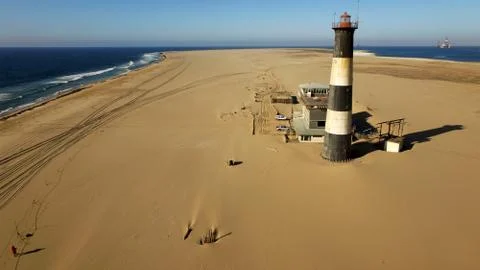 Sand peninsula with old lighthouse in Namibia, southern Africa Fotos de archivo