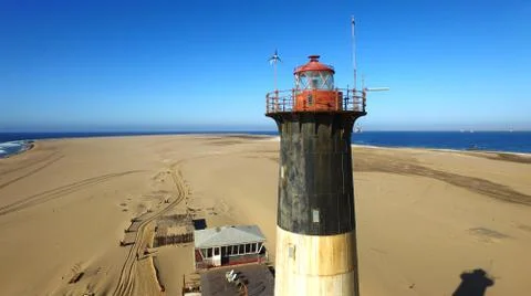 Sand peninsula with old lighthouse in Namibia, southern Africa Fotos de archivo