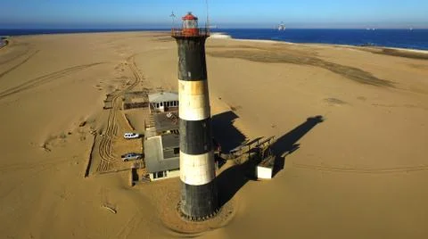 Sand peninsula with old lighthouse in Namibia, southern Africa Fotos de archivo