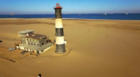 Sand peninsula with old lighthouse in Namibia, southern Africa Fotos de archivo