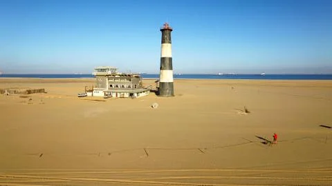 Sand peninsula with old lighthouse in Namibia, southern Africa Fotos de archivo