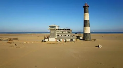 Sand peninsula with old lighthouse in Namibia, southern Africa Fotos de archivo
