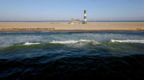 Sand peninsula with old lighthouse in Namibia, southern Africa Fotos de archivo
