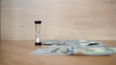 The sand is poured to the end. Many falling 100 dollars banknotes at once Stock Footage 151971926