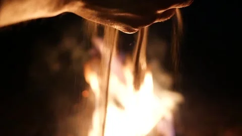 Sand pouring with campfire Stock Footage 238363204