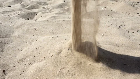 Sand is pouring in slow motion Stock Footage 152466931