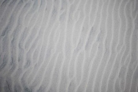 Sand ripple pattern in waves Stock Photos