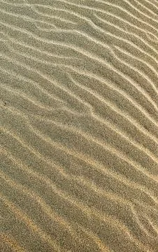 Sand ripples abstract pattern texture natural landscape background Stock Photos