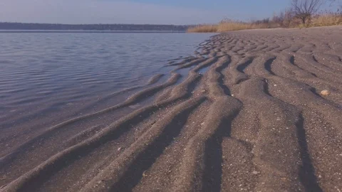 Sand Ripples on a Beach - Closeup Vertical Tilt Footage Stock Footage 124584763