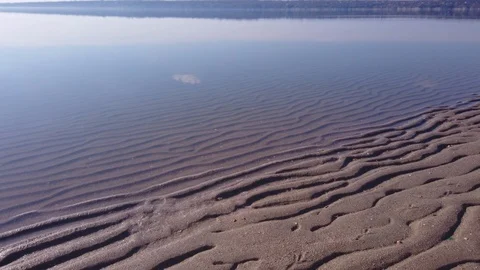 Sand Ripples on a River Beach As Seen Through Transparent Water Stock Footage 124582295