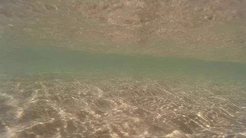 Sand rises underwater with a wave Stock Footage 87118921