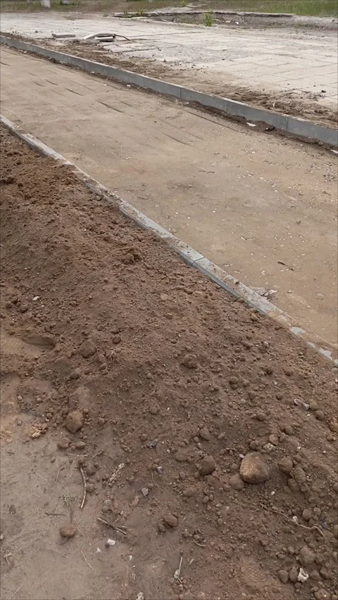 Sand on the road. Road construction, Stock Footage 312250298