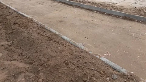 Sand on the road. Road construction, Stock Footage 312250313