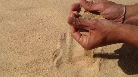Sand running through the hands Stock Footage 38033988